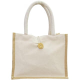 Bolso crudo botón  28x21x12 ref 22